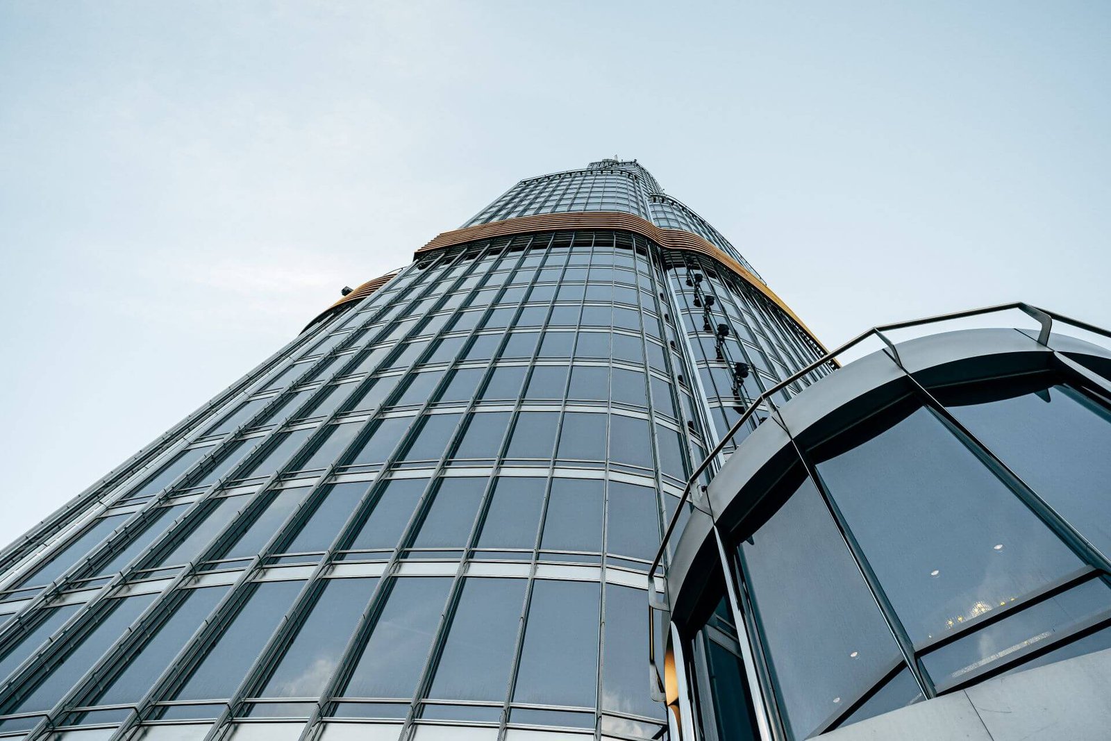 tall-glass-building-against-blue-sky-view-from-th-2023-11-27-05-02-25-utc.jpg
